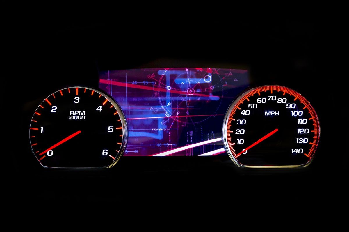 Modern light car mileage (dashboard, milage) isolated on a black background. New display of a modern car. Futuristic.